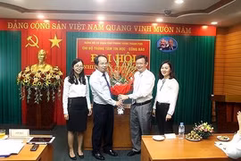 Ông Nguyễn Ngọc Kỳ (người thứ hai từ bên phải sang) được bổ nhiệm Giám đốc Sở Thông tin và Truyền thông Hà Nội - Ảnh: An ninh Thủ đô