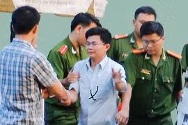 Ông Lợi bị bắt. Ảnh: Kh.Uyên