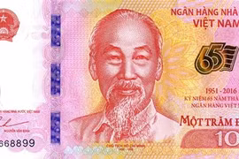 Thiết kế mặt trước đồng tiền lưu niệm.
