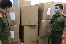 Cơ quan Công an thu giữ tang vật đầu cơ khẩu trang bán sang Malaysia (Ảnh: CA TP.HCM cung cấp)