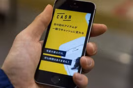 Giao diện ứng dụng Cash trên smartphone tại Tokyo. Ảnh Bloomberg.