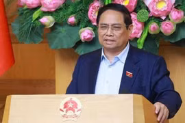 Thủ tướng Phạm Minh Chính chủ trì họp đánh giá tác động của các cuộc xung đột trên thế giới ảnh hưởng đến tình hình kinh tế-xã hội trong nước. (Ảnh: Dương Giang/TTXVN).