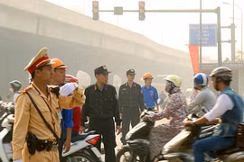 Cảnh sát Hà Nội sẽ chặn các ngã tư khi đoàn xe hộ tống Tổng thống OBama đi qua. Ảnh minh họa: Bá Đô