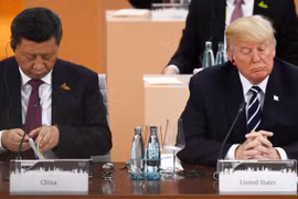 Chủ tịch Trung Quốc Tập Cận Bình (trái) và Tổng thống Mỹ Donald Trump (phải). Ảnh: CNBC
