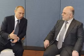 Tổng thống Nga Vladimir Putin trò chuyện với thủ tướng Iraq Haider al-Abadi tại New York trong cuộc họp của Đại hội đồng LHQ tháng 9 vừa qua - Ảnh: Reuters
