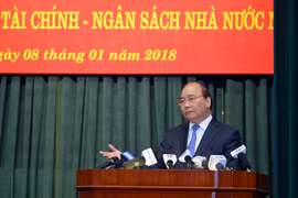 Thủ tướng Nguyễn Xuân Phúc phát biểu tại Hội nghị ngành tài chính sáng 8/1. Ảnh: VGP
