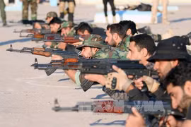 Binh sĩ Iraq tham gia cuộc diễn tập quân sự ở al-Zubair, gần thành phố Basra ngày 13/2. Ảnh: AFP/TTXVN