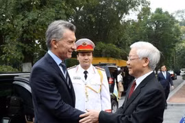 Tổng Bí thư, Chủ tịch nước Nguyễn Phú Trọng đón Tổng thống Argentina Mauricio Macri thăm cấp Nhà nước Việt Nam (ảnh năm 2019). (Ảnh: Trí Dũng/TTXVN)