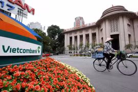 NHNN đã chấp thuận cho Vietcombank tăng vốn thêm 10%: Mở đường đón GIC? (Ảnh: Nikkei)