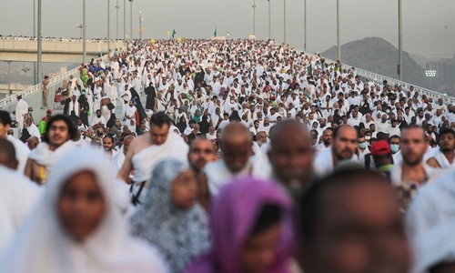 Pilgrims make their way to pray at Mount Arafat, near Mecca in Saudi Arabia this morning. Photograph: Mosa'ab Elshamy/AP