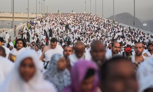 Pilgrims make their way to pray at Mount Arafat, near Mecca in Saudi Arabia this morning. Photograph: Mosa'ab Elshamy/AP