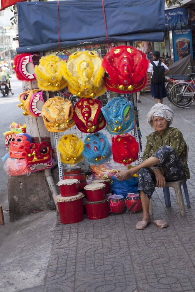 Mùa lân bán tết- Ảnh: Sơn Khôi Mùa lân bán tết- Ảnh: Sơn Khôi