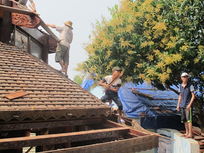 Tiến độ tháo dỡ được đẩy nhanh. Ảnh: H.L