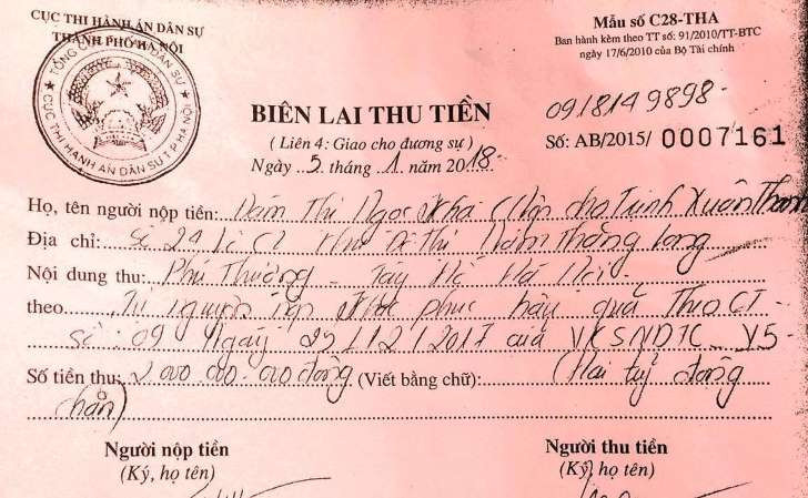 Gia đình Trịnh Xuân Thanh đã nộp tiền tại Cục thi hành án. Ảnh: Tiền Phong