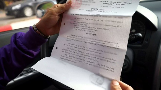 Ngoài áp lực phải trả các khoản nợ, đàm... cho hãng taxi, tài xế mắc lỗi bị phạt rất nặng . Ảnh minh họa:Phan Anh.