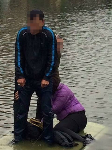 Clip nữ lái xe lùi xế hộp "tắm hồ" giữa trời lạnh 6 độ C ở Hà Nội ảnh 1