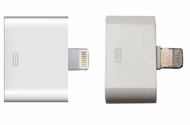 Phụ kiện chuyển đổi cổng 30 pin xịn (trái) có thiết kế trơn nhẵn và liền mạch. Phụ kiện chuyển đổi cổng 30 pin xịn (trái) có thiết kế trơn nhẵn và liền mạch.