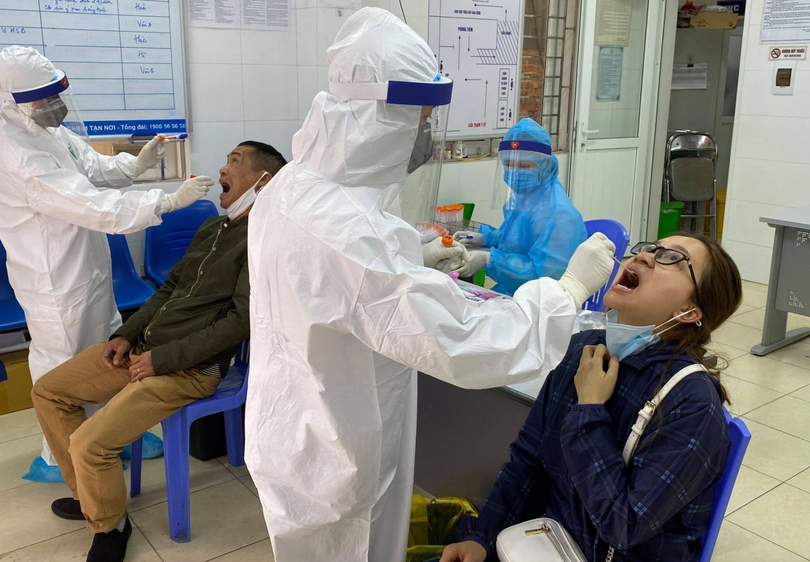 Lấy mẫu xét nghiệm COVID-19 (Ảnh - SYT) Lấy mẫu xét nghiệm COVID-19 (Ảnh - SYT)