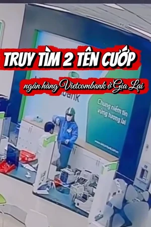 Cầm vật giống súng uy hiếp, 2 tên cướp lấy nhiều cọc tiền ở ngân hàng Vietcombank