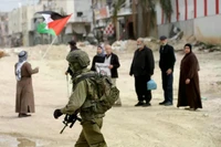 Israel ngày càng sử dụng nhiều hơn công nghệ trí tuệ nhân tạo để kiểm soát người Palestine. Ảnh: Anadolu.