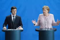 Tổng thống Ukraine Vladimir Zelensky và Thủ tướng Đức lúc bấy giờ Angela Merkel. Ảnh: Getty.