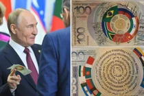 Tổng thống Nga Vladimir Putin xuất hiện cùng tờ tiền giấy lạ tại hội nghị thượng đỉnh BRICS (Ảnh: Getty)