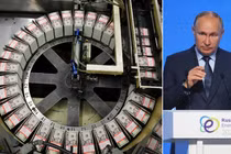 Tổng thống Putin nói rằng Mỹ đang tự làm suy yếu vị thế thống trị của đồng USD (Ảnh: Reuters)