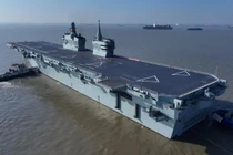 Tàu tấn công đổ bộ Type 076 mang UAV đầu tiên của Trung Quốc trong chuyến thử nghiệm trên biển đầu tiên ngày 14/11. Ảnh: Xinhua.