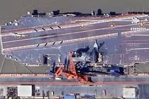 Những vết sơn mới được nhìn thấy trên sàn của tàu sân bay. Ảnh: Handout.