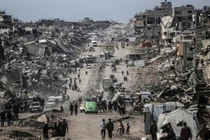 Người Palestine di tản trở về nhà ở Gaza. Ảnh: Getty.