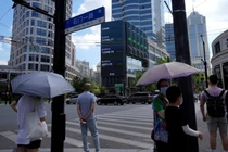 Nhiều chủ sở hữu nhà tại Thượng Hải phải hạ giá mới bán được nhà (Ảnh: SCMP)