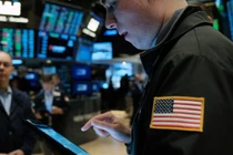 Thị trường chứng khoán Mỹ có phen "đỏ lửa" sau cuộc họp của FOMC (Ảnh: Getty)