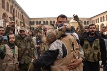 Các chiến binh nổi dậy ăn mừng ở Damascus, Syria trong hôm 8/12. Ảnh: WSJ.