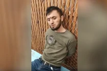 Một trong số những nghi phạm trong vụ tấn công khủng bố đẫm máu ở Nga (Ảnh: RT)