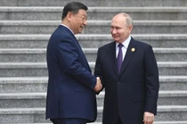 Tổng thống Nga Vladimir Putin đã gặp gỡ Chủ tịch Trung Quốc Tập Cận Bình trong chuyến thăm Bắc Kinh ngày 16/5 (Ảnh: Sputnik)