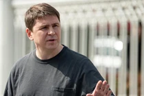 Ông Mikhail Podoliak (Ảnh: AFP)