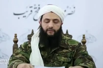 Hình ảnh thủ lĩnh HTS Abu Mohammed al-Jolani phát biểu tại một địa điểm không xác định năm 2016. Ảnh:: Reuters.