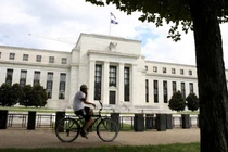 Giới chức Fed vẫn tin rằng chưa phải lúc để thảo luận về việc cắt giảm lãi suất (Ảnh: Reuters)