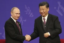 Tổng thống Nga Vladimir Putin và Chủ tịch Trung Quốc Tập Cận Bình. Ảnh: Getty.