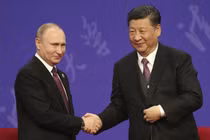 Tổng thống Nga Vladimir Putin và Chủ tịch Trung Quốc Tập Cận Bình. Ảnh: Getty.