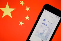 Việc mở rộng sử dụng đồng tiền số của Trung Quốc mang tới nhiều cơ hội, nhưng cũng không ít thách thức (Ảnh: Reuters)