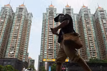 Khủng hoảng bất động sản ở Trung Quốc ảnh hưởng sâu rộng tới người mua nhà và các hộ gia đình (Ảnh: DW)