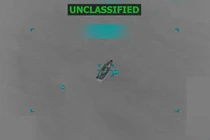 Một chiếc thuyền trôi nổi ngoài khơi bờ biển Venezuela trong bức ảnh chụp màn hình này được trích từ video phát hành ngày 14/10. Ảnh: Reuters.