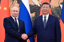 Tổng thống Nga Vladimir Putin và Chủ tịch Trung Quốc Tập Cận Bình trước cuộc gặp tại Bắc Kinh hôm 2/9. Ảnh: Reuters.