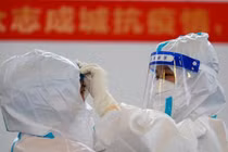 Các nhà khoa học Trung Quốc cho rằng COVID-19 xuất hiện ở Mỹ trước đợt dịch ở Vũ Hán (Ảnh: AFP)