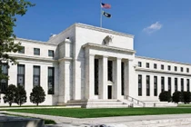 Fed đưa ra tín hiệu sẽ giảm tốc độ nâng lãi suất (Ảnh: Getty)