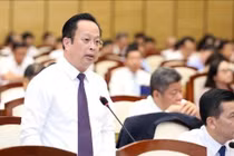 Giám đốc Sở Giáo dục và Đào tạo Hà Nội Trần Thế Cương tại Kỳ họp HĐND thành phố ngày 5/7. 