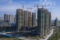 Trung Quốc tiếp tục có động thái mới nhằm giải cứu ngành bất động sản trong nước (Ảnh: Bloomberg)