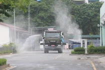 Phun khử khuẩn Bệnh viện K Tân Triều (Ảnh - Hoàng Anh) 