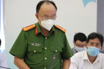 Đại tá Trần Văn Chính - phó giám đốc Công an tỉnh Bình Dương - phát biểu tại cuộc họp báo ngày 17-8 - Ảnh Tuổi Trẻ